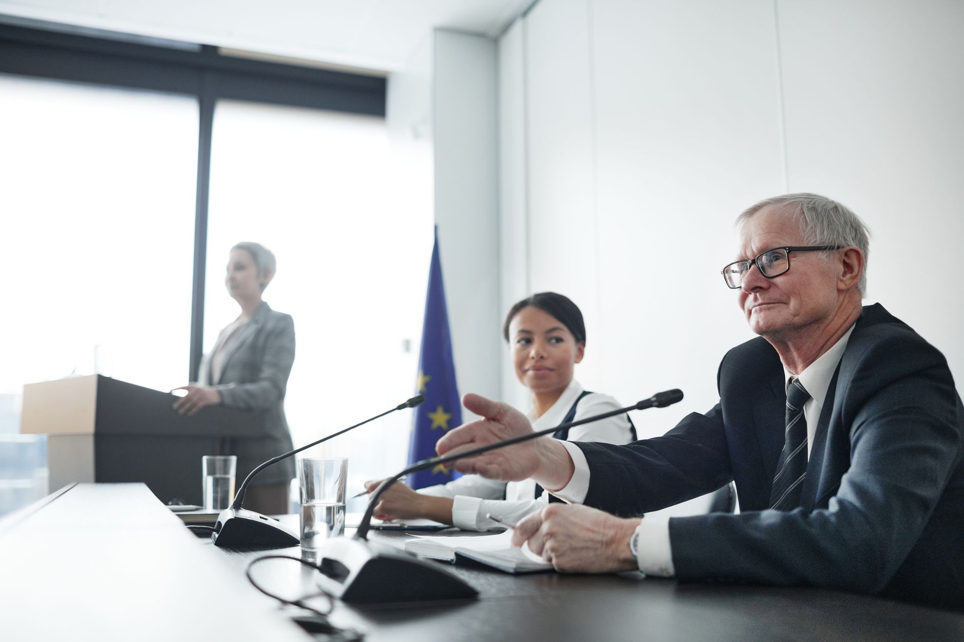 Qualifi Level 7 Diploma in International Business Law — Panelists at an EU conference discussing law and diplomacy.