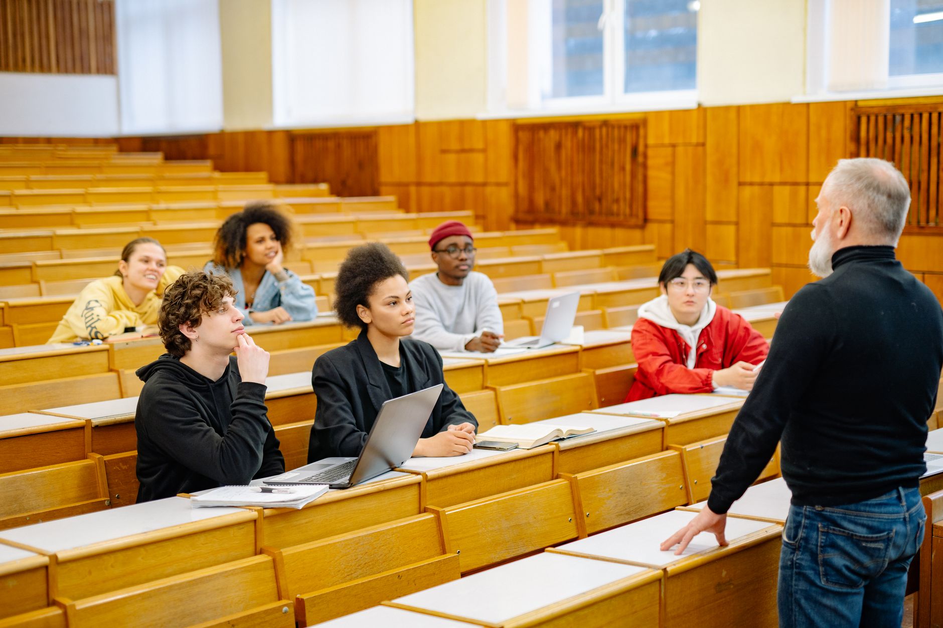 Qualifi Level 4 Diploma in Internet of Things (Smart Home) — University students engaging in a diverse classroom setting with a lecturer.