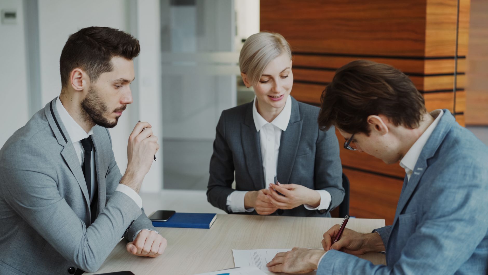 Human Resource Planning — Professional team in business meeting, discussing strategy at office.