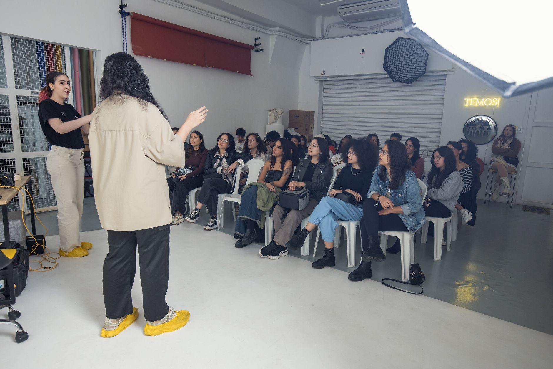 Biopsychology — Interactive workshop with a diverse group engaging in a learning session indoors.