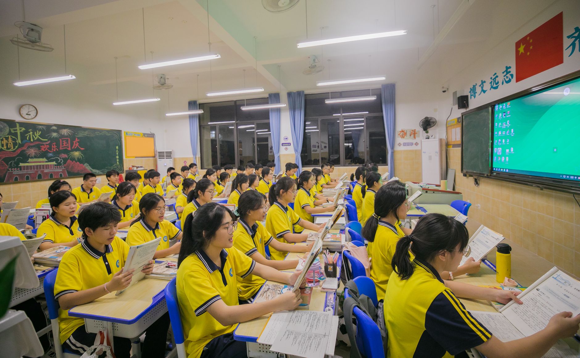 Social and Cultural Psychology and Psychology of Human Development — Asian students in a classroom engaged in learning with a teacher, focusing on education and collaboration.