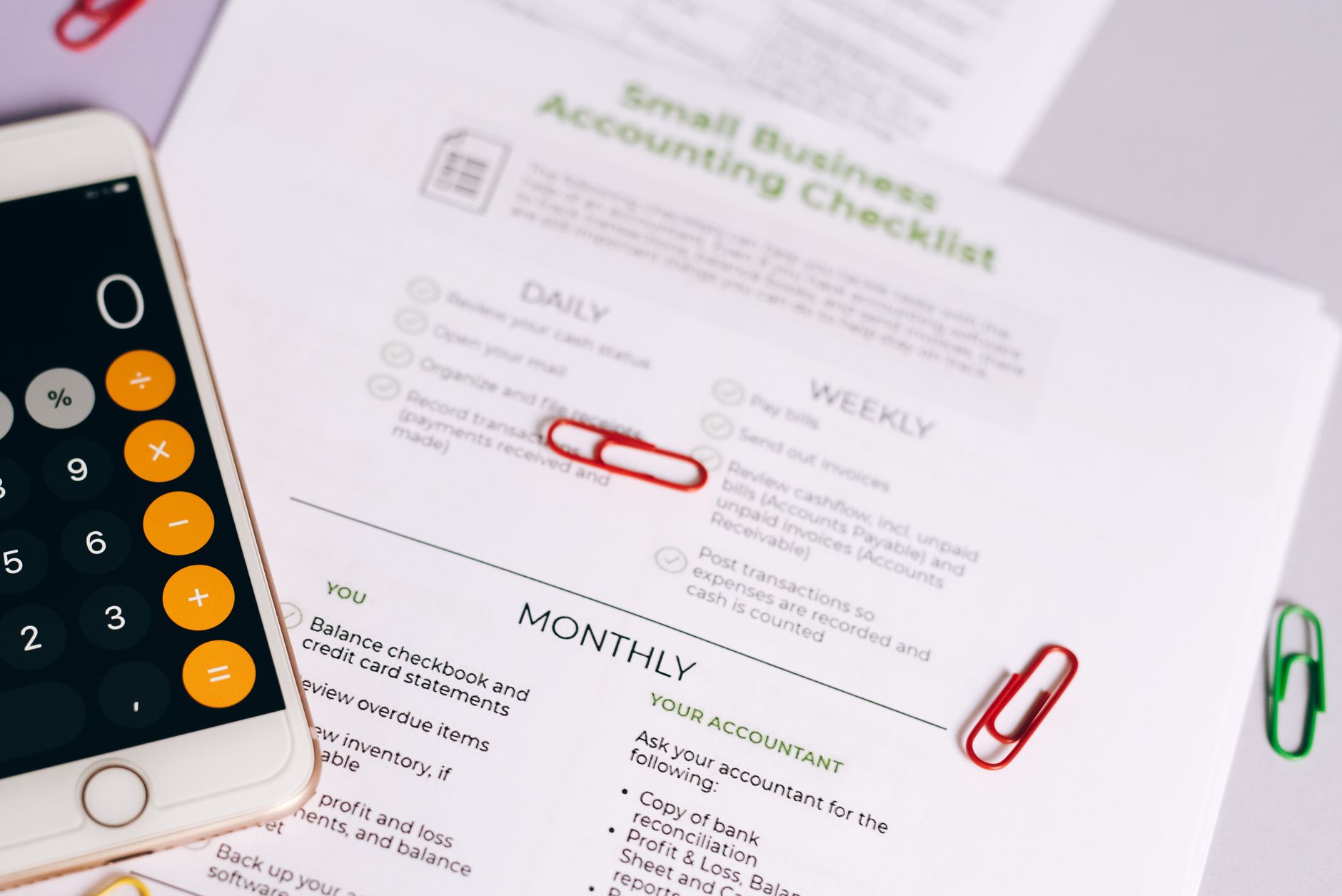 Ethical Behaviour and Corporate Governance — Image of a checklist and calculator for managing small business accounting tasks efficiently.