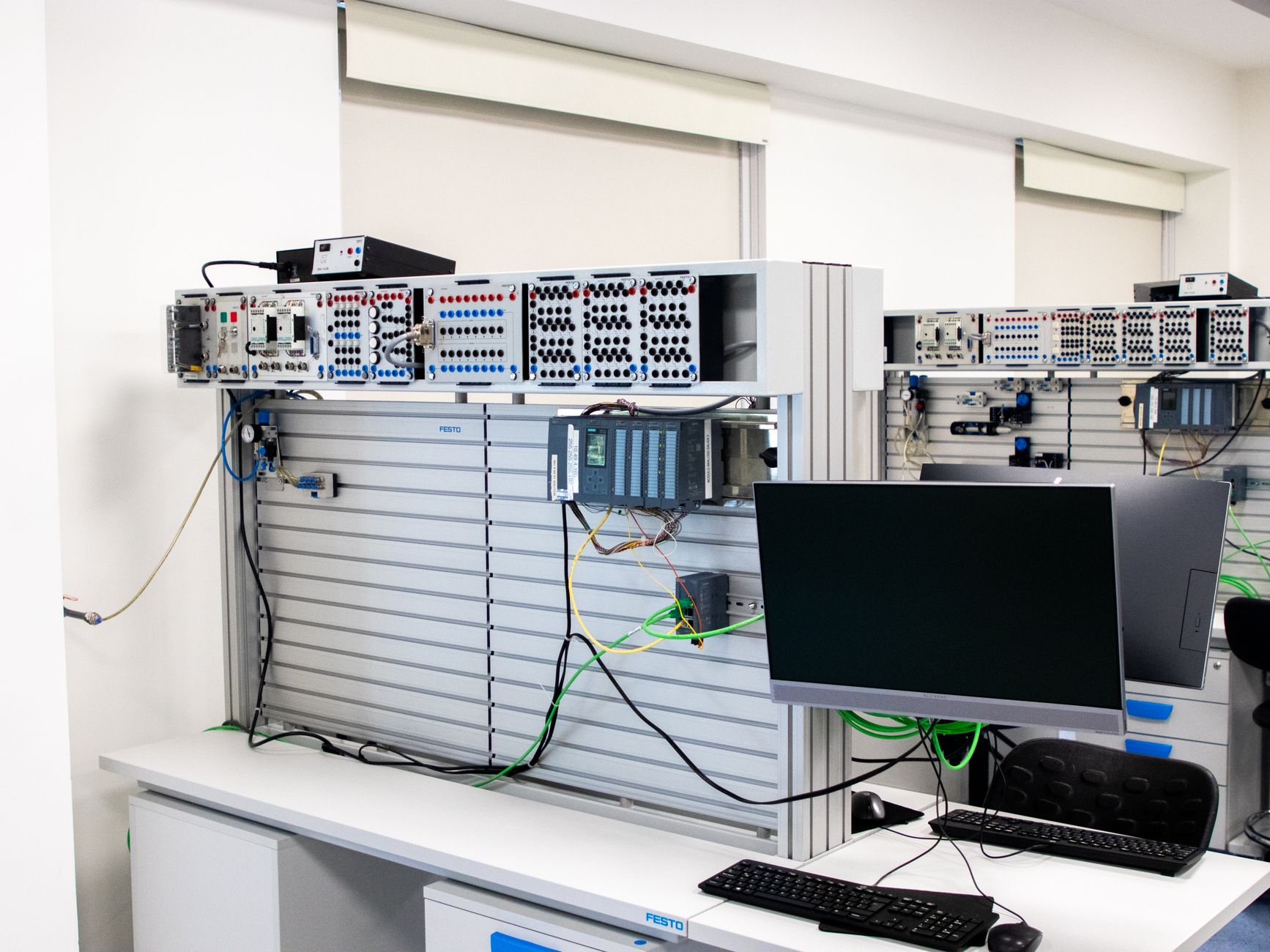 Core Units — A contemporary office showcasing a server rack and computer workspace, ideal for tech and business settings.