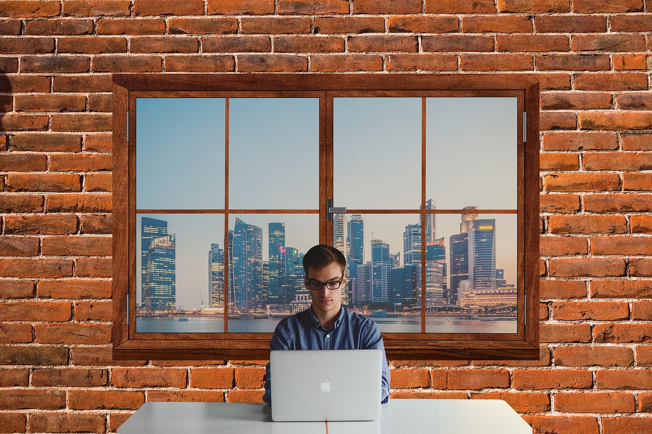 Information Technology and IT Ethics — Man, working, it, information technology, computer, business, city, office, laptop, desk, view, innovation, corporate, executive, typing, window, skyscraper, brown business, brown computer, brown office, brown technology, brown laptop, brown window, brown desk, brown company, brown information, brown innovation