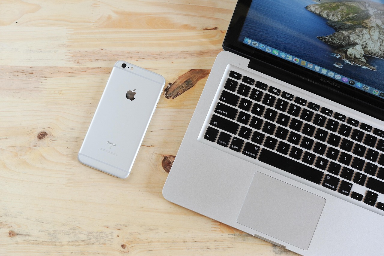 Mobile Device and Data Risks — Laptop, mobile phone, table, phone, iphone, macbook, computer, device, apple, technology, desk, workplace, workspace, office, closeup, mobile phone, phone, iphone, iphone, iphone, iphone, iphone, office