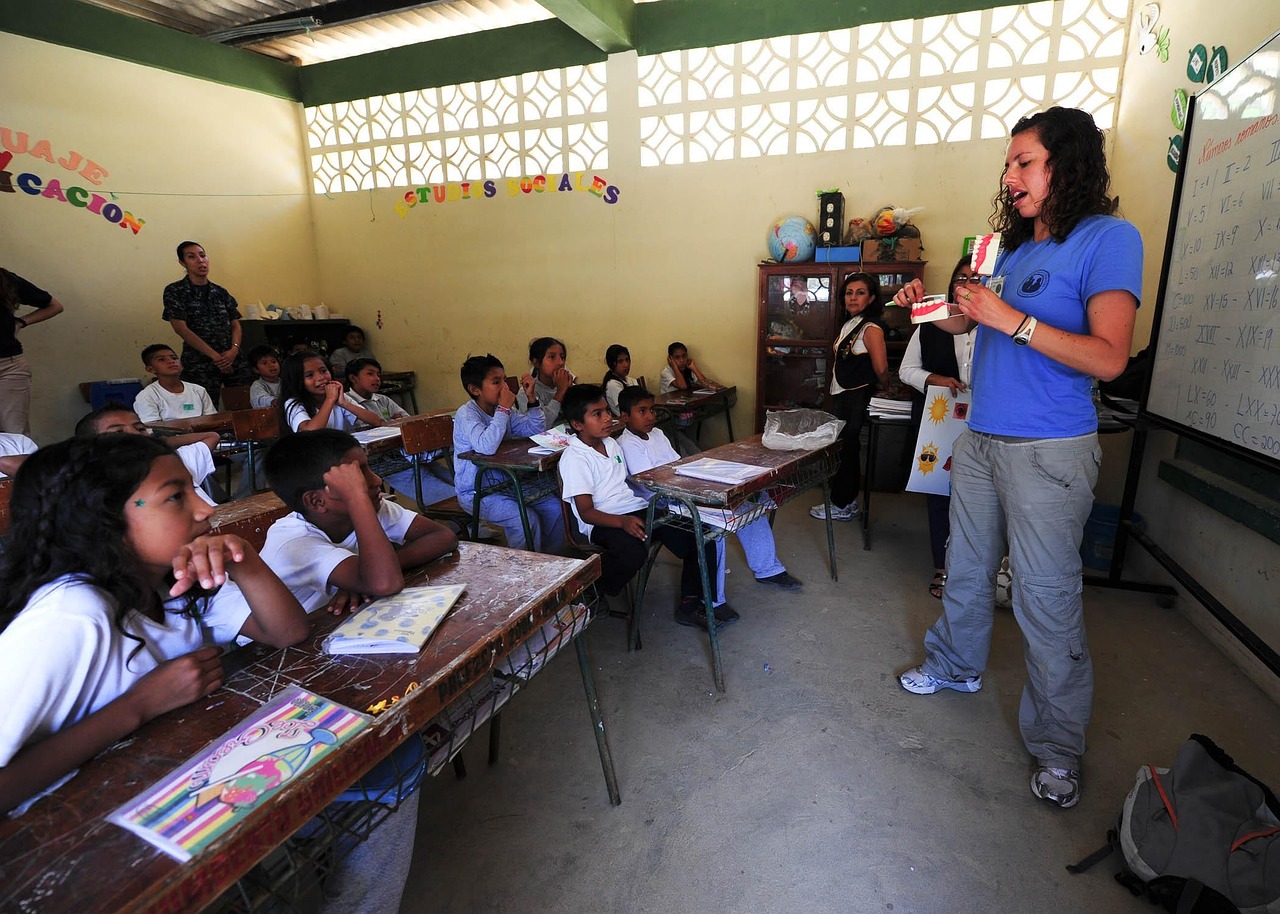 Engaging Learners — School, classroom, boys, girls, students, teacher, female, woman, ecuador, teaching, tables, chairs, teacher, teacher, teacher, teacher, teacher, teaching, teaching
