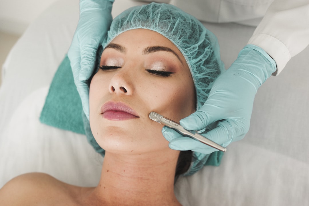 Advanced Aesthetic Procedures: Microneedling — Woman receiving facial skincare treatment