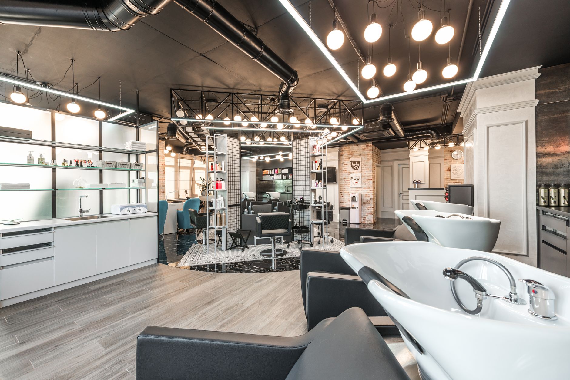 units. Minimum credits: 32 — Backwash chairs with sinks placed in spacious modern beauty salon with stylish design and various cosmetology products with professional equipment