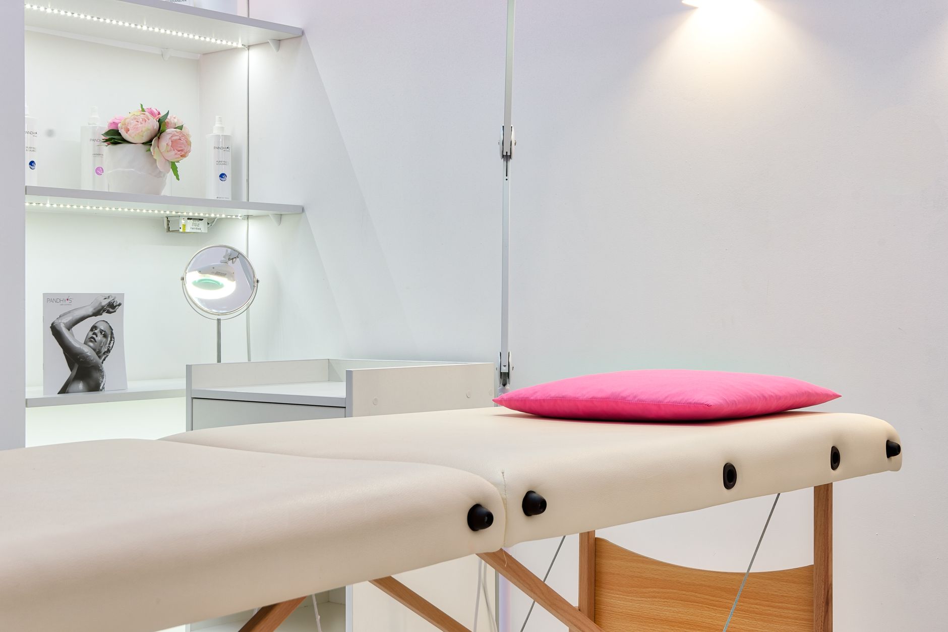 Advanced Aesthetic Procedures: Mesotherapy — Interior of modern beauty office with couch for skincare procedures under glowing light