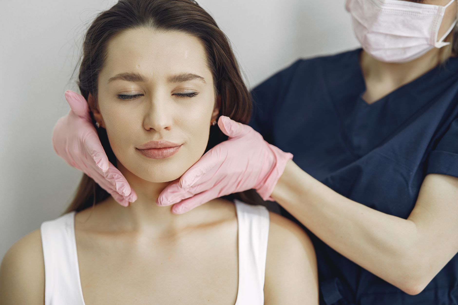 Botulinum Toxin Injections to the Face and Neck — Aesthetician provides a relaxing facial treatment to a woman in a spa, enhancing her beauty and skincare routine.