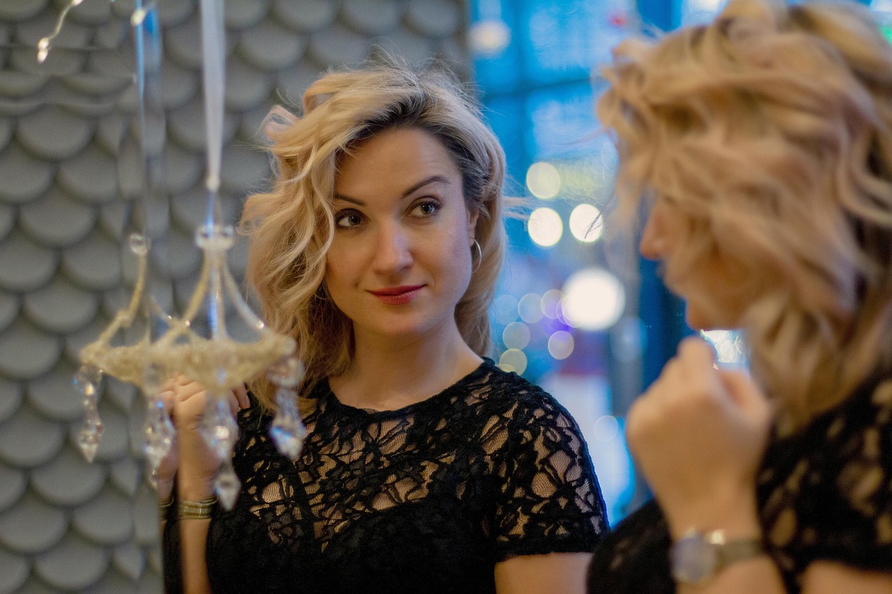 Set and dress hair — Girl, mirror, reflection, makeup, hairstyle, beauty salon, black dress, fashion, blonde, stylish, hair, fancy hairstyle
