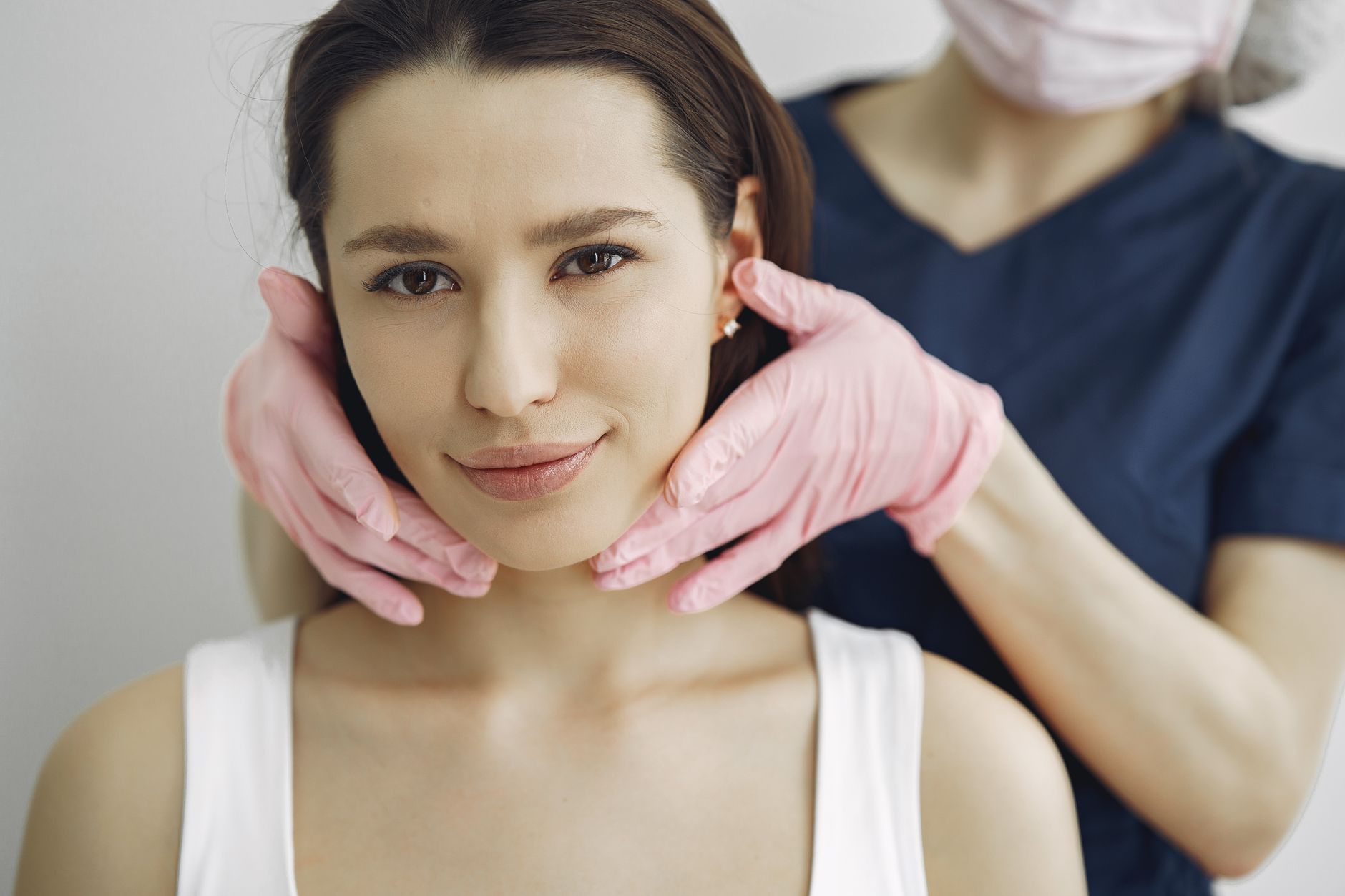 Skin Morphology and the Inflammatory Response — A woman receiving a facial skincare treatment indoors, highlighting beauty and wellness.