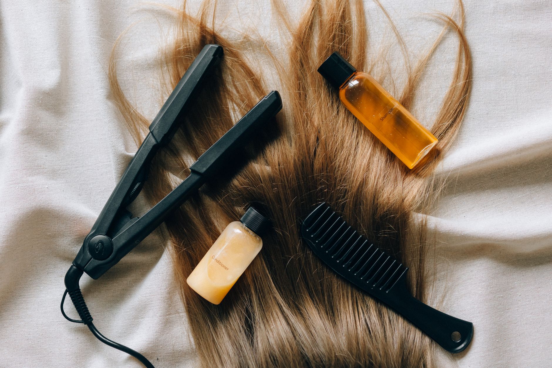 Cultivate, maintain, and repair locks — Aesthetic flat lay of hair products and tools for styling and grooming.