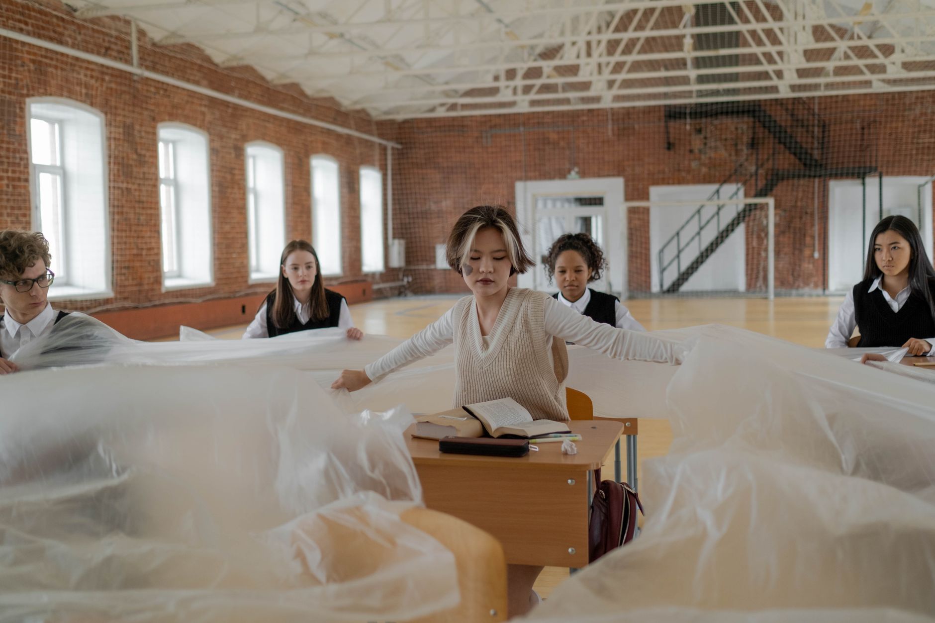 Body wrap treatments — Group of students in a classroom setting engaged with interactive materials, fostering learning.