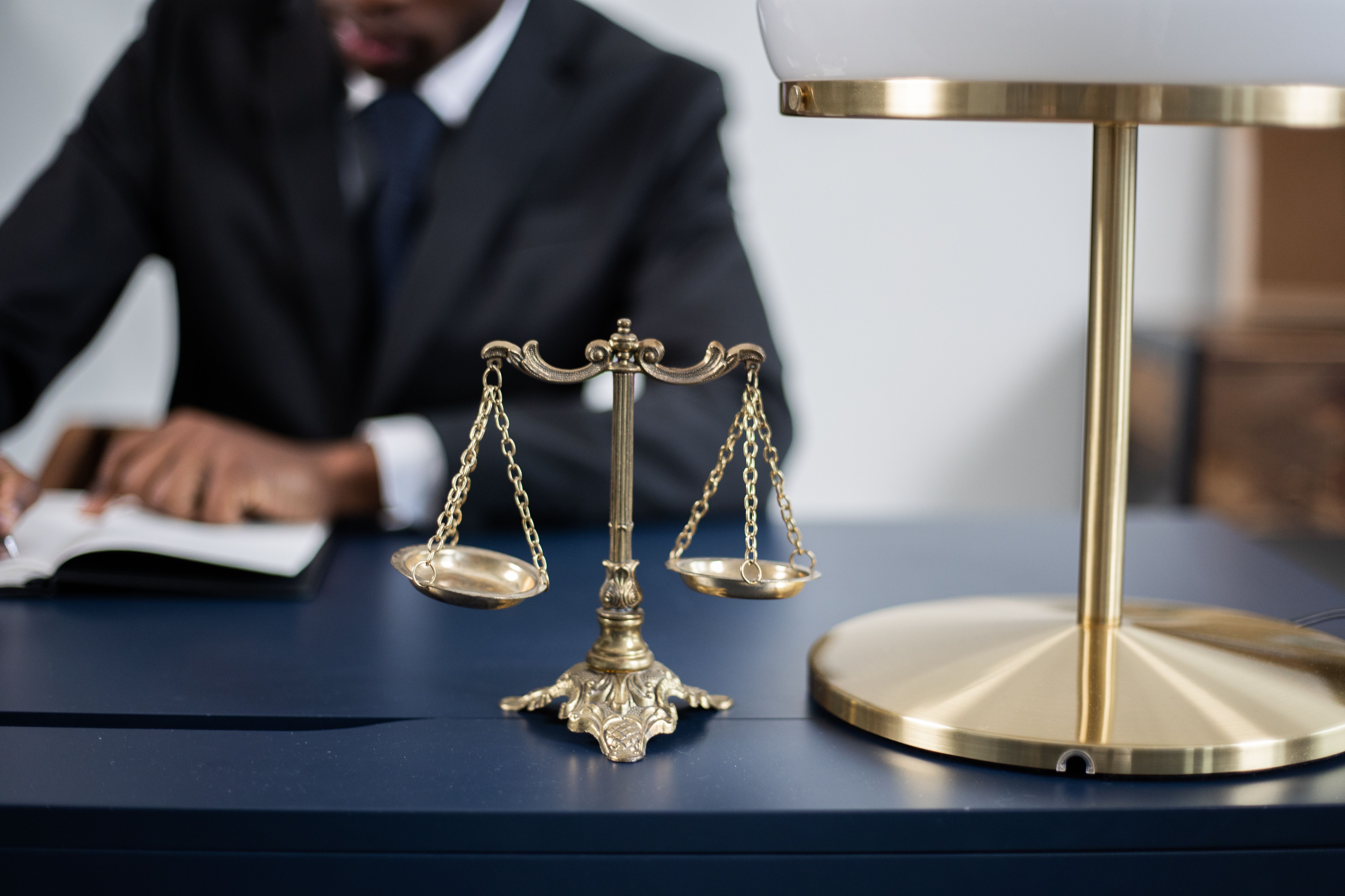 Pathway Level 3 Extended Diploma in Business and Law — A diverse group of professionals in a business consulting office setting.